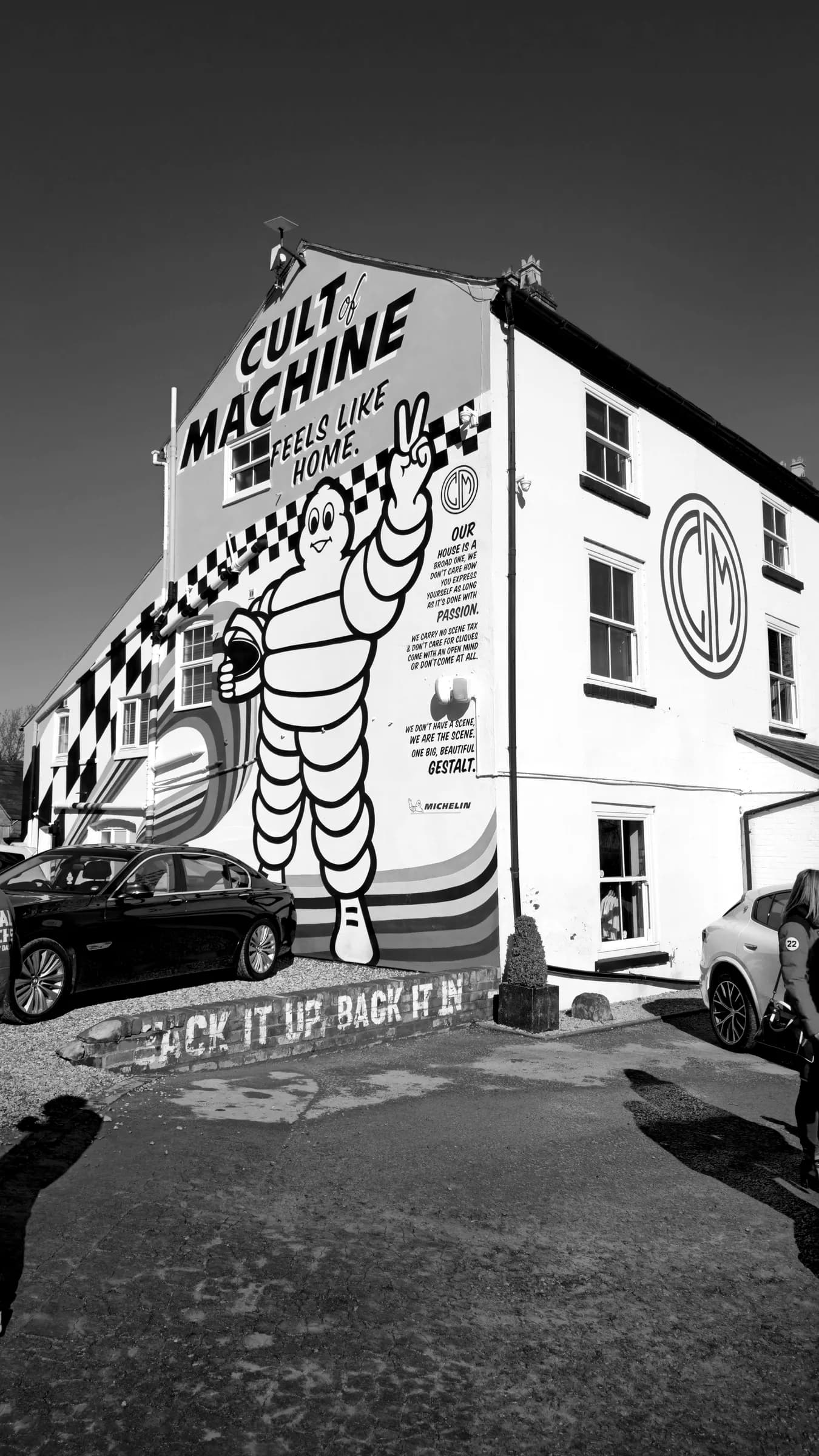 Cars outside Caffeine & Machine