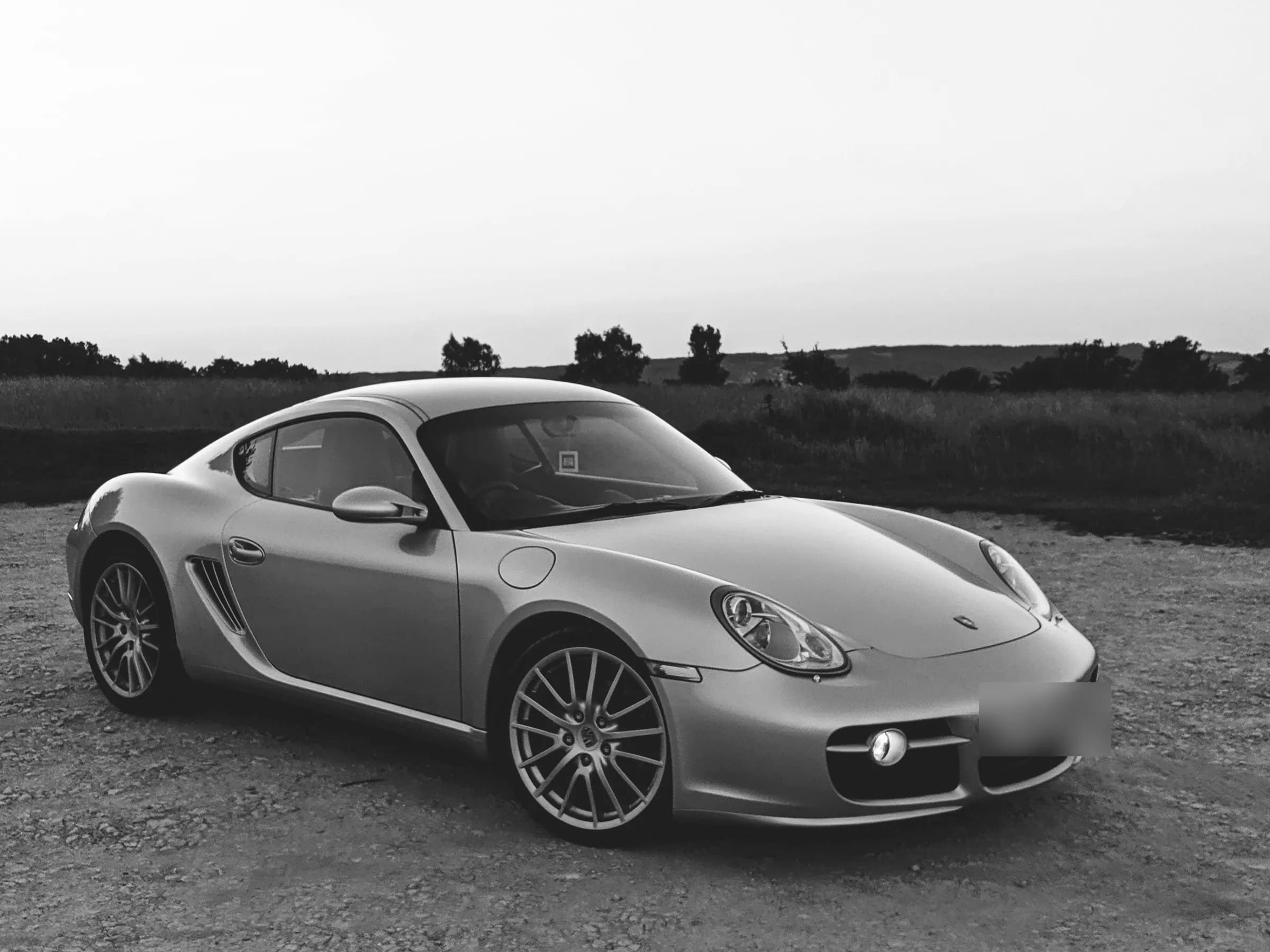 A silver Cayman parked on Rodborough Common